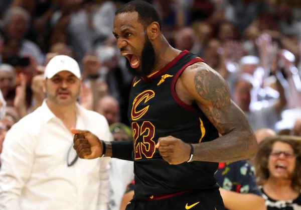 LeBron James of the Cleveland Cavaliers reacts after a basket in the fourth quarter against the Boston Celtics during Game 6 of the 2018 NBA Eastern Conference Finals at Quicken Loans Arena