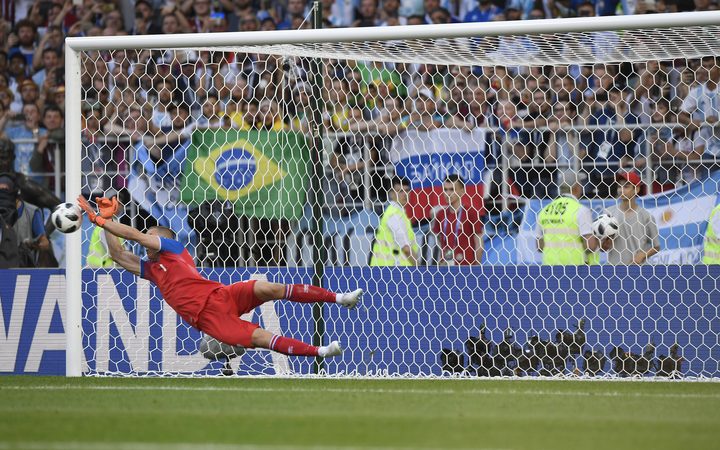 Iceland keeper Hannes Por Halldorsson saves a penalty