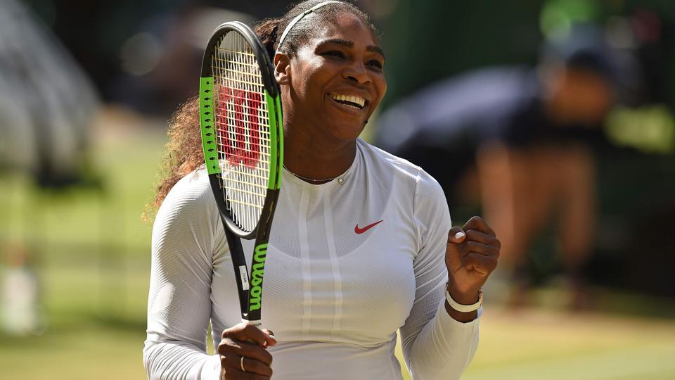 Serena Williams celebrates after winning against Camila Giorgi during their Wimbledon quarter-final encounter