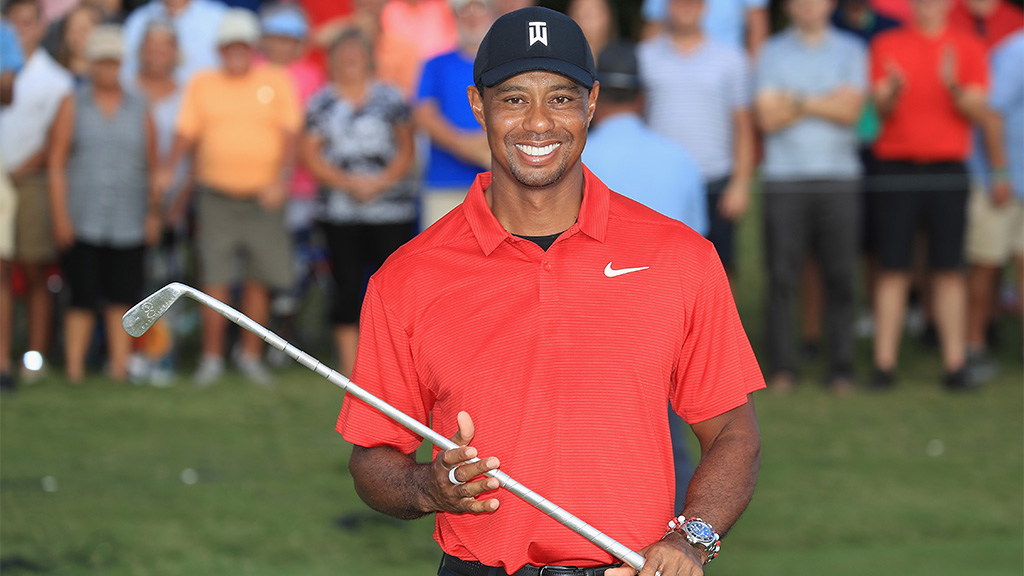 Tiger Woods hits from the third tee during the final round of the Tour Championship golf tournament Sunday Sept. 23 2018 in Atlanta